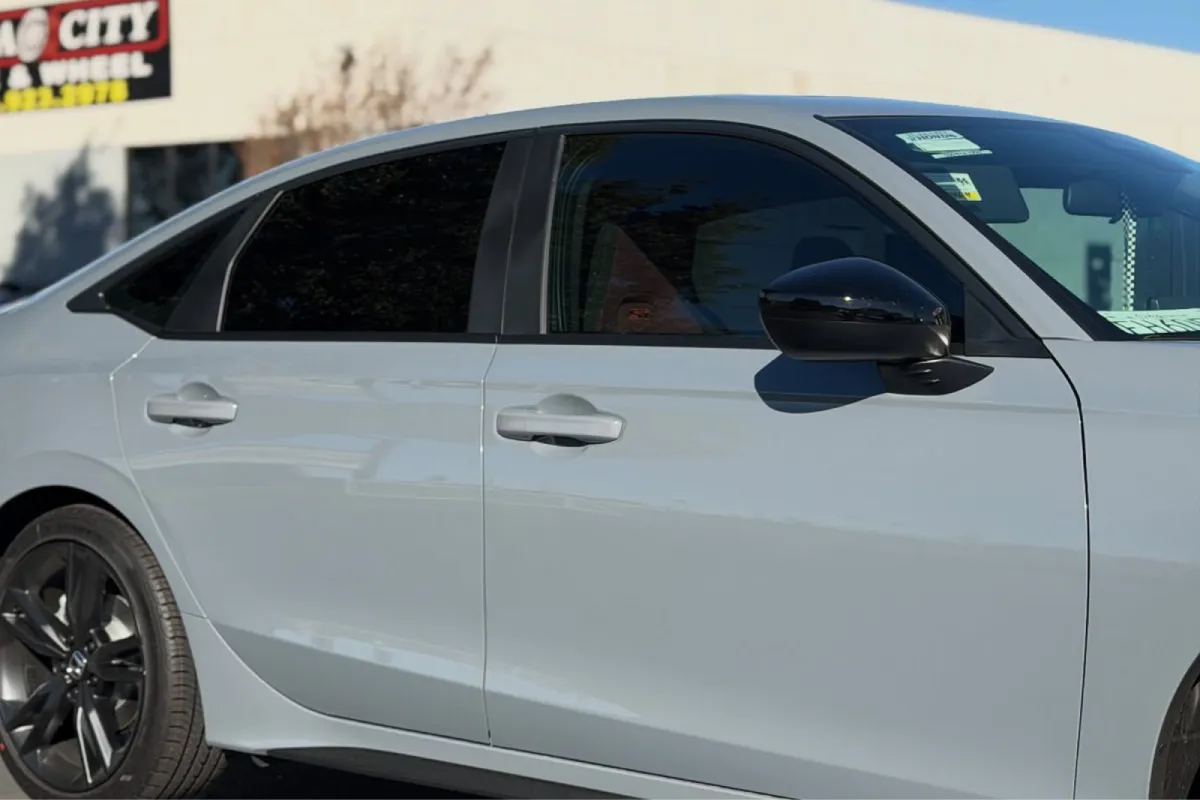 White car with dark window tint in Chico, CA.